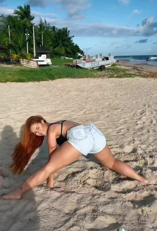 4. Sexy Mirela Janis in Black Swimsuit at the Beach while Twerking