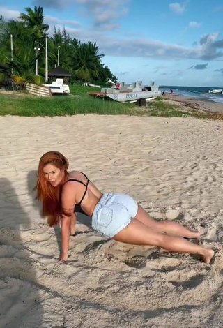 5. Sexy Mirela Janis in Black Swimsuit at the Beach while Twerking