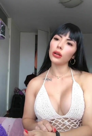 Sexy Natalia Shows Cleavage in White Hot Top