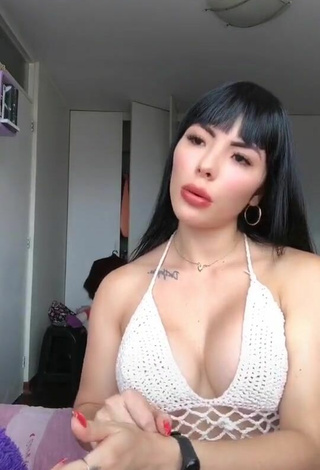 2. Sexy Natalia Shows Cleavage in White Hot Top