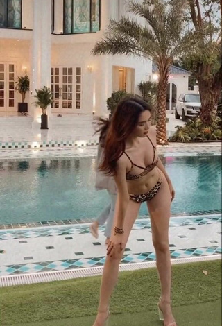 1. Sexy Ngoc Trinh in Leopard Bikini at the Swimming Pool