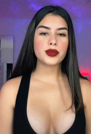 Cute Nicole García Shows Cleavage in Black Top