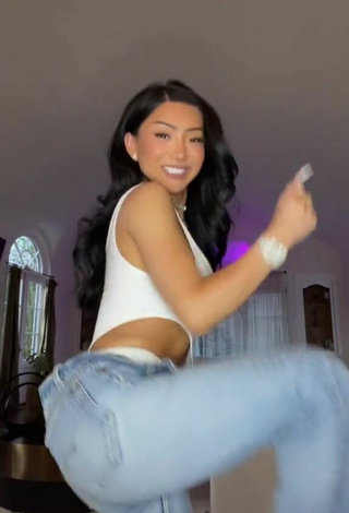 2. Sexy Nikita Dragun Shows Cleavage in White Bodysuit