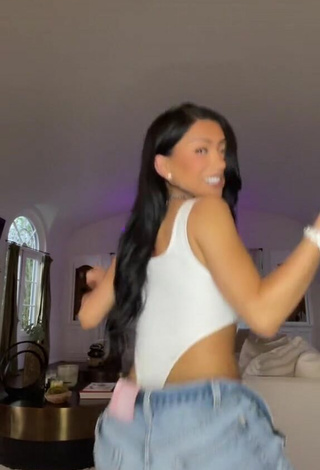 3. Sexy Nikita Dragun Shows Cleavage in White Bodysuit