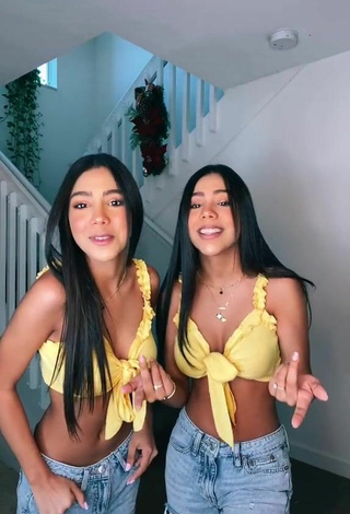 5. Sexy Melanie & Meila Shows Cleavage in Yellow Crop Top