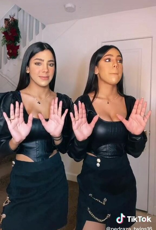 2. Sexy Melanie & Meila Shows Cleavage in Black Bodysuit
