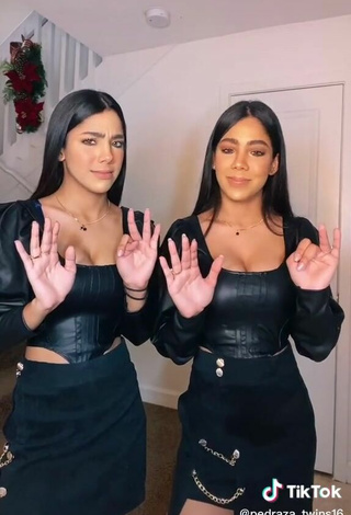 5. Sexy Melanie & Meila Shows Cleavage in Black Bodysuit