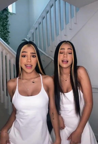 Sexy Melanie & Meila Shows Cleavage in White Dress