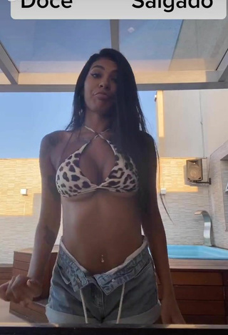 Beautiful Jully Oliveira Shows Cleavage in Sexy Leopard Bikini Top