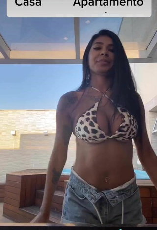 5. Beautiful Jully Oliveira Shows Cleavage in Sexy Leopard Bikini Top