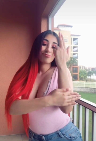 Sexy Ana Daniela Martínez Buenrostro Shows Cleavage in Pink Top on the Balcony