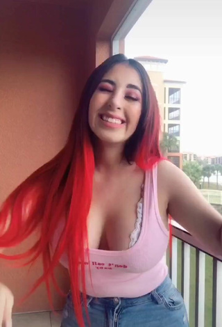 3. Sexy Ana Daniela Martínez Buenrostro Shows Cleavage in Pink Top on the Balcony