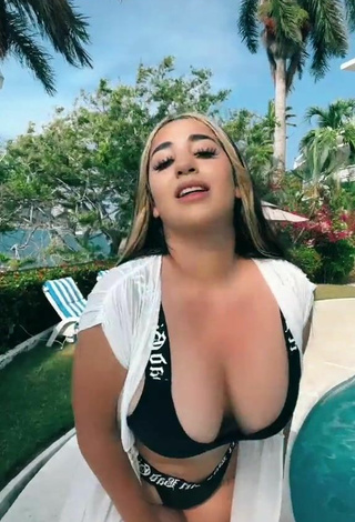 Sexy Ana Daniela Martínez Buenrostro Shows Cleavage in Black Bikini at the Swimming Pool