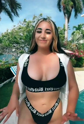 3. Sexy Ana Daniela Martínez Buenrostro Shows Cleavage in Black Bikini at the Swimming Pool