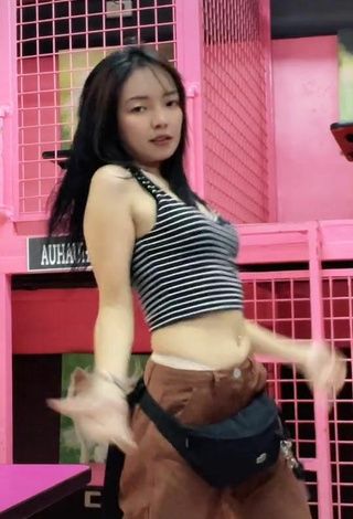 4. Hot Rosemarie Tan in Striped Crop Top