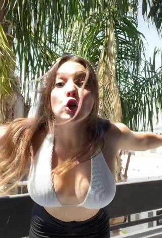2. Sexy Sofia Kochanova Shows Cleavage in White Bikini Top