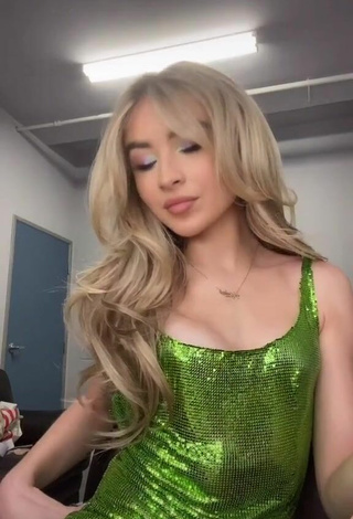 Sexy Sabrina Carpenter in Green Dress