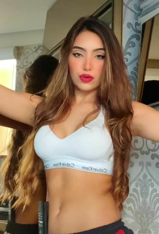 5. Sexy Vanessa Lopes in White Sport Bra while doing Belly Dance