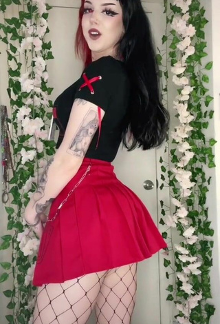 Sexy Caroline Carr in Red Skirt
