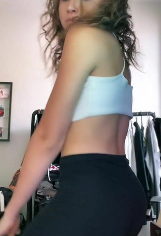 3. Sexy Nikly in White Crop Top