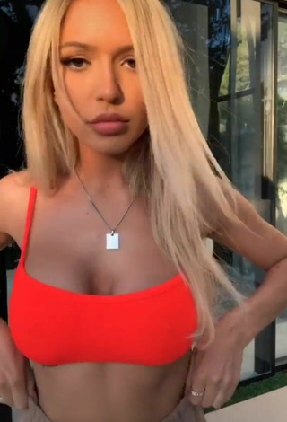 Beautiful Abby Rao Shows Cleavage in Sexy Orange Bikini Top