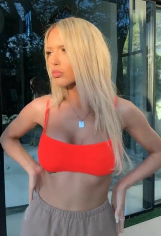 4. Beautiful Abby Rao Shows Cleavage in Sexy Orange Bikini Top
