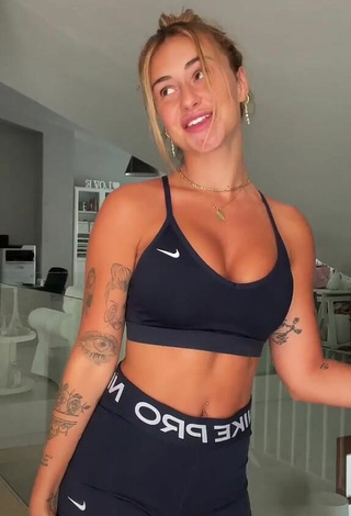 2. Beautiful Abril Cols Shows Cleavage in Sexy Black Sport Bra