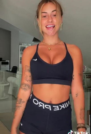 5. Beautiful Abril Cols Shows Cleavage in Sexy Black Sport Bra