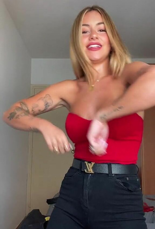 Sexy Abril Cols Shows Cleavage in Red Top