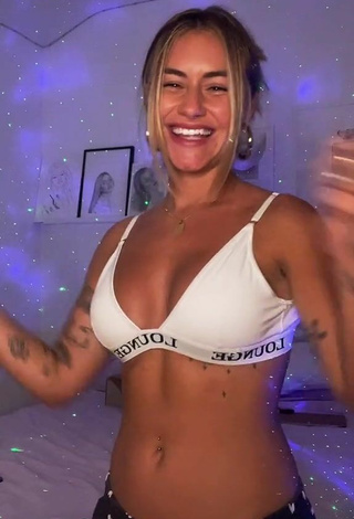Hot Abril Cols Shows Cleavage in White Sport Bra