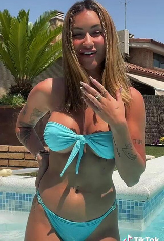 5. Sexy Abril Cols Shows Cleavage in Blue Bikini at the Pool