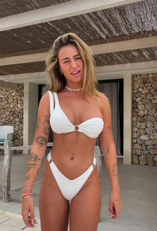 Abril Cols Shows Cleavage in Hot White Bikini