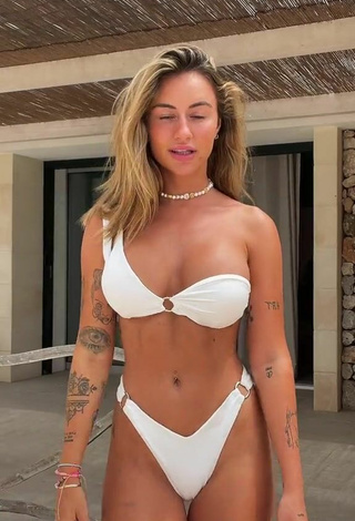 Abril Cols Shows Cleavage in Sexy White Bikini