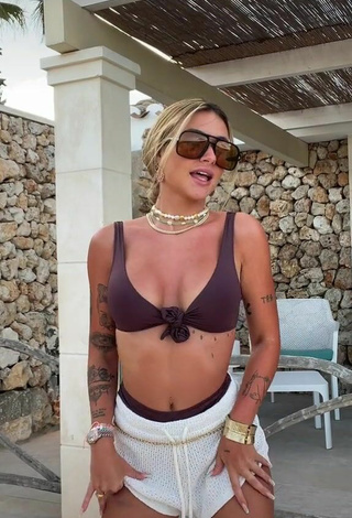 2. Hottie Abril Cols Shows Cleavage in Brown Bikini Top
