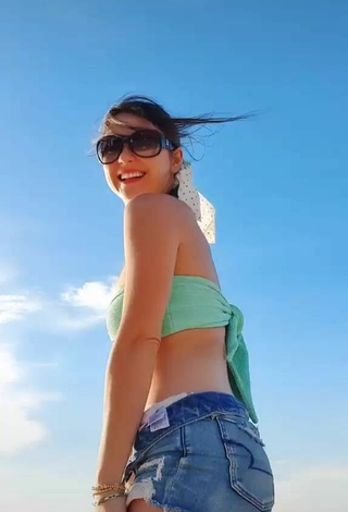 4. Sexy Ale Ivanova Shows Cleavage in Green Bikini Top at the Beach