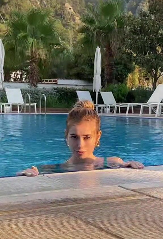 1. Hot Alexandra Romanova in Green Bikini Top at the Pool
