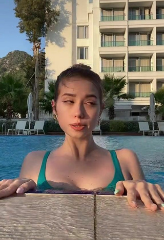 1. Sexy Alexandra Romanova in Green Bikini Top at the Pool