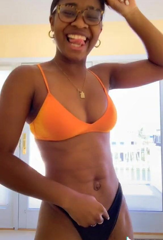 5. Cute Angel Ogbonna in Orange Bikini Top