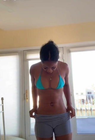 Sexy Angel Ogbonna Shows Cleavage in Blue Bikini Top