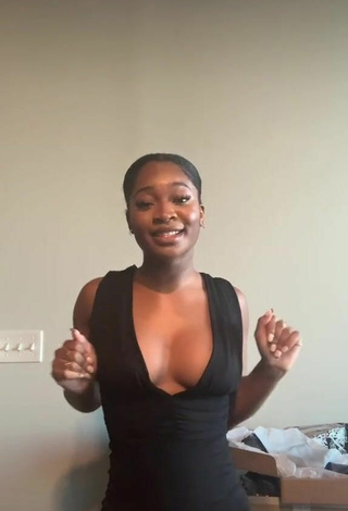 2. Sweetie Angel Ogbonna Shows Cleavage in Black Dress