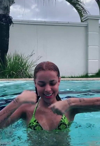 2. Sexy Anna Catarina in Snake Print Bikini Top at the Pool
