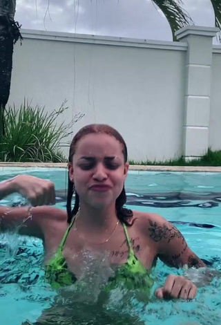 4. Sexy Anna Catarina in Snake Print Bikini Top at the Pool
