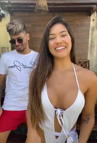 3. Sweetie Ayarla Souza Shows Cleavage in White Swimsuit