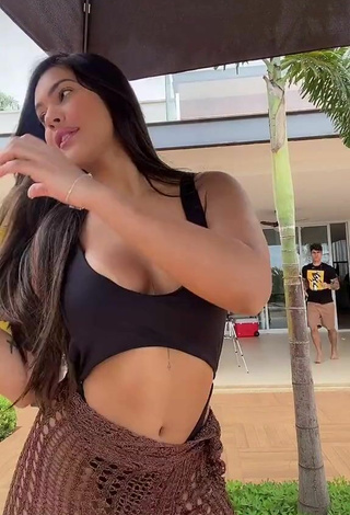 2. Hot Ayarla Souza Shows Cleavage in Black Swimsuit