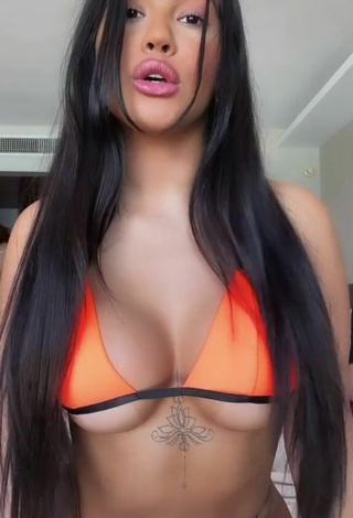 5. Hot Ayarla Souza Shows Cleavage in Orange Bikini Top