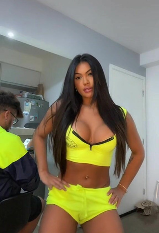 Sexy Ayarla Souza Shows Cleavage in Yellow Crop Top