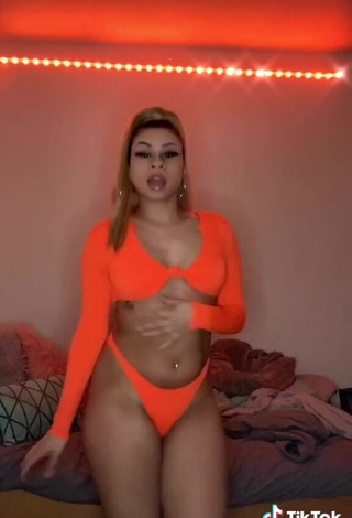 5. Erotic BbygShai in Electric Orange Bikini