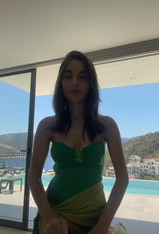 3. Sexy Cagla Simsek in Green Swimsuit at the Swimming Pool