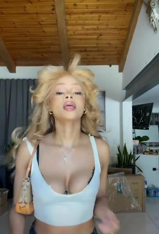 2. Sexy Caeli Shows Cleavage in White Crop Top