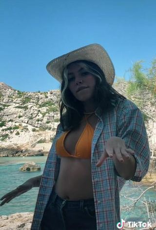 5. Cute Claudia García in Orange Bikini Top in the Sea